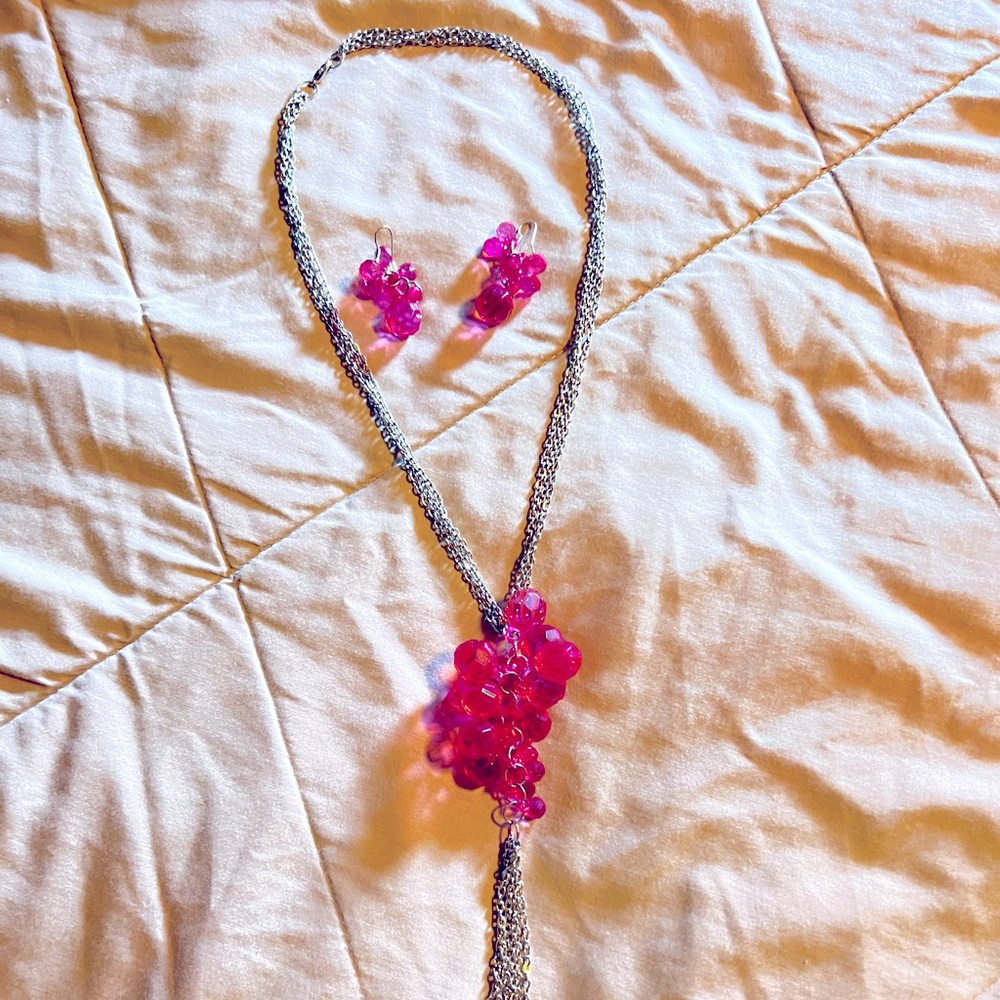 Pink and silver matching necklace and earrings.